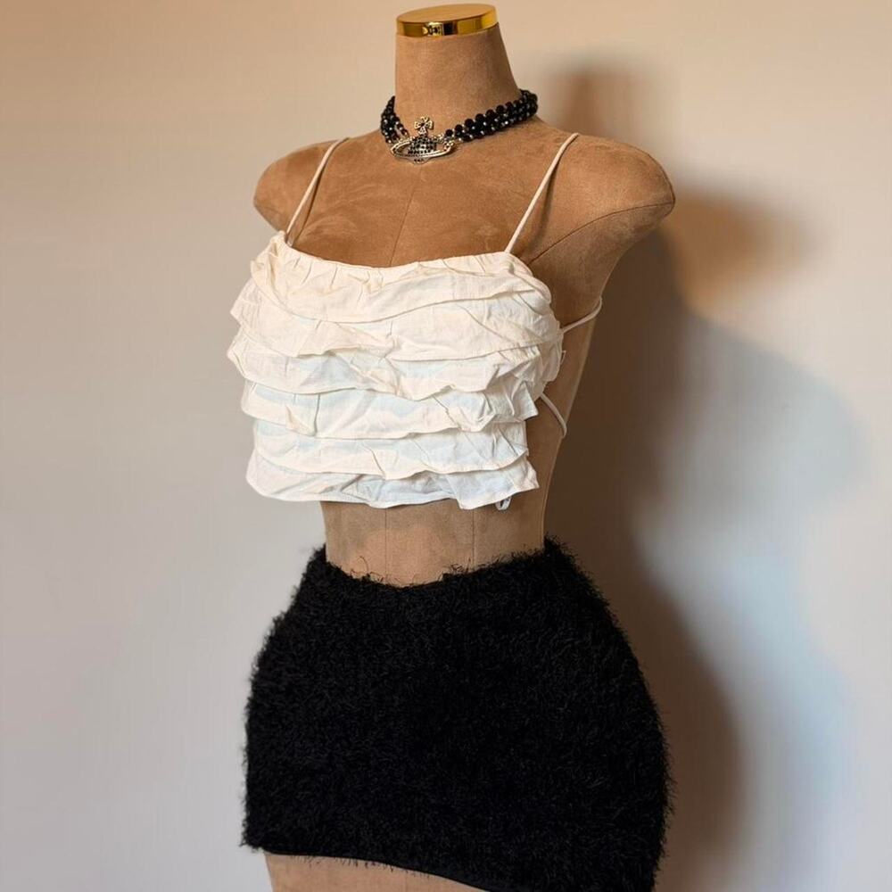 White ruffle crop top with